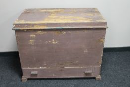 A 19th century pine trunk fitted with a drawer