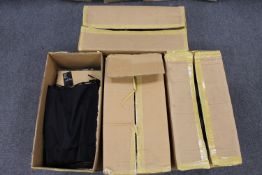 New stock : Four boxes of black satin skirts,