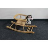 A child's nursery rocking horse