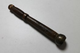 A wooden and brass mounted club