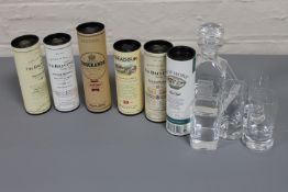 Six miniature bottles of whisky, in tubes, Bowmore 12 years,