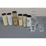 Six miniature bottles of whisky, in tubes, Bowmore 12 years,