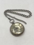 A silver dial antique silver pocket watch on heavy silver Albert chain