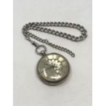 A silver dial antique silver pocket watch on heavy silver Albert chain