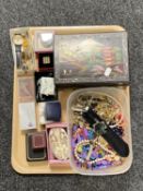 A tray of costume jewellery, lacquered trinket box, wristwatches,