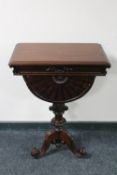 A Regency style mahogany occasional table with lift top