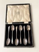 Six cased silver teaspoons