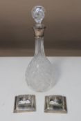 A crystal and silver mounted decanter,