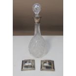 A crystal and silver mounted decanter,