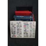 A box of albums of stamps, Stanley Gibbons books,