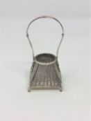 A Chinese silver novelty inkwell in the form of a wicker basket, height 9cm,