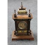 A continental inlaid stained beech wood bracket clock