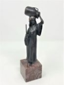 After Franz Bergman, A patinated bronze figure of a woman carrying an urn, stamped B within vase,