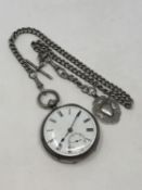 An antique silver pocket watch on heavy silver Albert