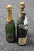 One bottle of Auctioneer's Port and two bottles of champagne