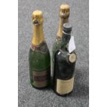 One bottle of Auctioneer's Port and two bottles of champagne