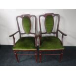 A pair of late 20th century green armchairs in green dralon
