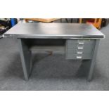 A metal framed writing desk