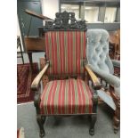 A continental heavily carved oak armchair,