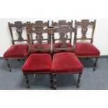 A set of six carved Victorian mahogany dining chairs