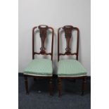 A pair of Victorian mahogany dining chairs