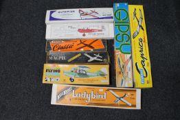 A box containing six vintage modelling kits, aircraft including Keilcraft,