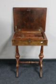 A late 19th century walnut work table