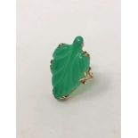 A gold mounted jade ring, size Q1/2 CONDITION REPORT: 8.