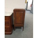 An Edwardian inlaid mahogany cabinet,