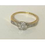 An 18ct gold diamond set ring, size M. CONDITION REPORT: 2.