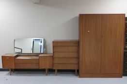 A three piece mid 20th century Teak Avalon bedroom suite
