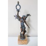 An antique spelter figure of Nike on square marble base