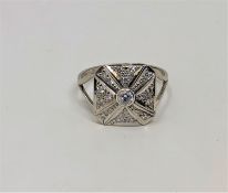 An 18ct white gold diamond set ring, size V. With certification.