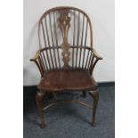 An elm Windsor kitchen armchair