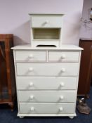 A painted pine six drawer chest and a bedside stand