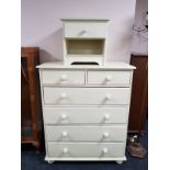 A painted pine six drawer chest and a bedside stand