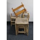 A nest of three bamboo and wicker tables,