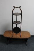 A folding cake stand and a copper topped coffee table