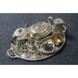An antique plated serving tray and a large quantity of plated wares