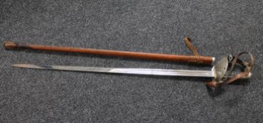 A British 1897 pattern infantry sword in leather scabbard