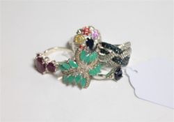 Five silver gem set dress rings