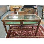 An Edwardian glazed oak shop display cabinet,