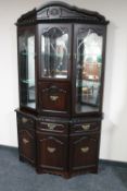 A reproduction shaped display cabinet