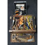A wooden case and aluminium case of wood working tools, chisels,