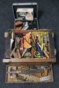 A wooden case and aluminium case of wood working tools, chisels,