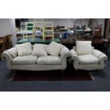 A Barker & Stonehouse two seater scroll arm settee with matching armchair,