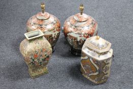 A pair of Japanese style gilded table lamps on wooden bases together with two further Japanese