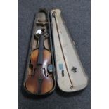 A late 19th century Stradivarius copy violin and bow in case (a/f)