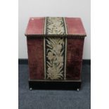 An antique fabric covered storage box