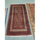 A Persian rug, on red ground,